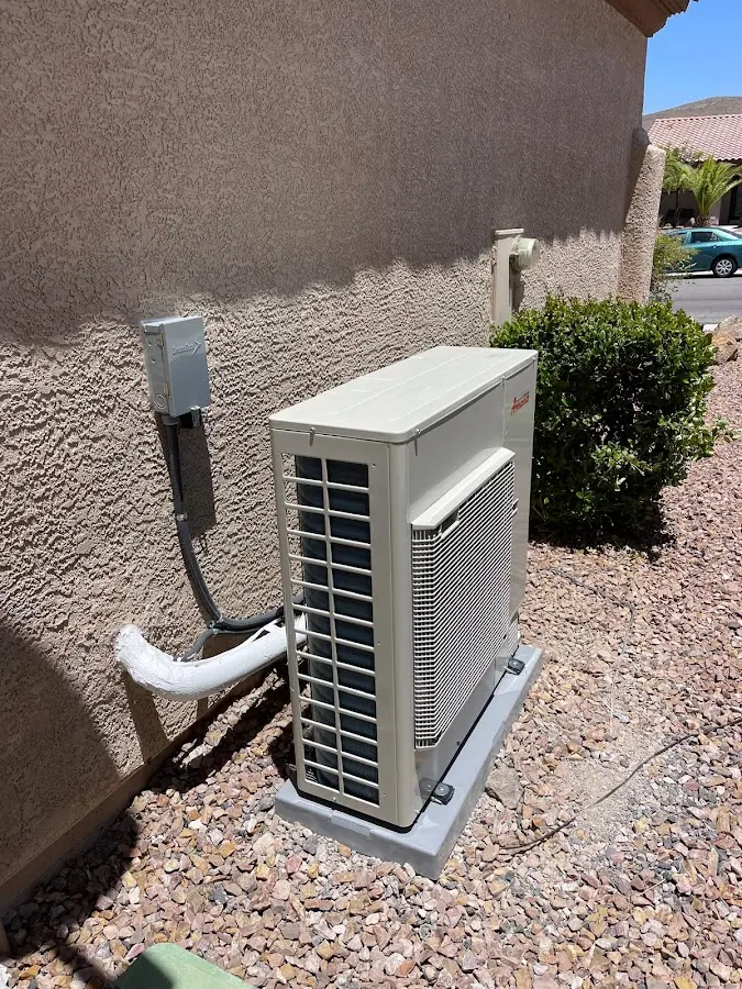 Residential air conditioning condenser unit in Brigantine